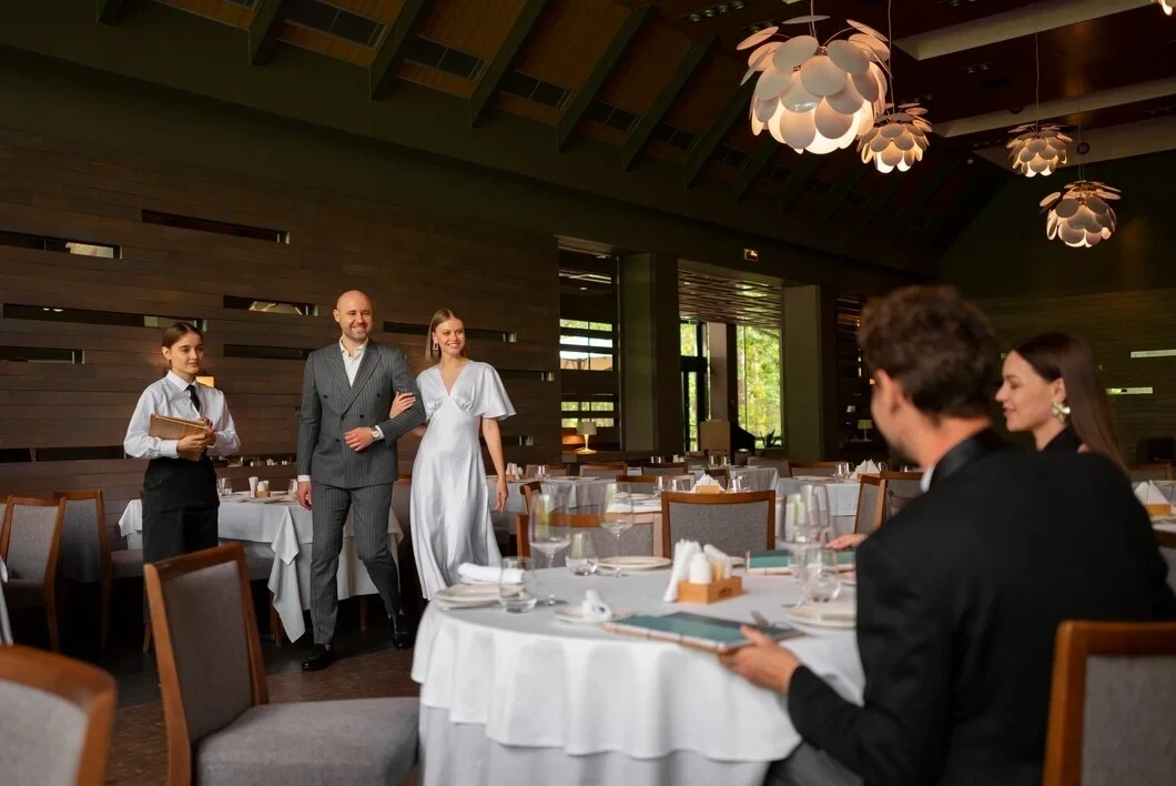 Event staff greeting guests at upscale restaurant